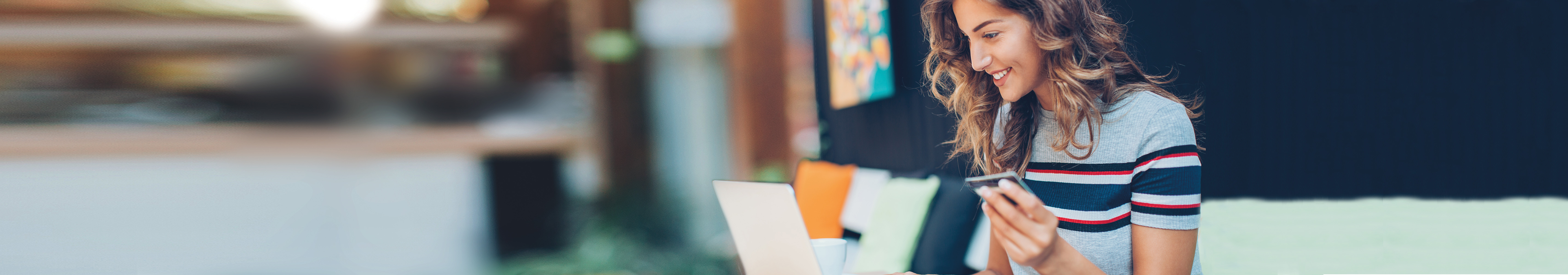 Young woman with debit card.
